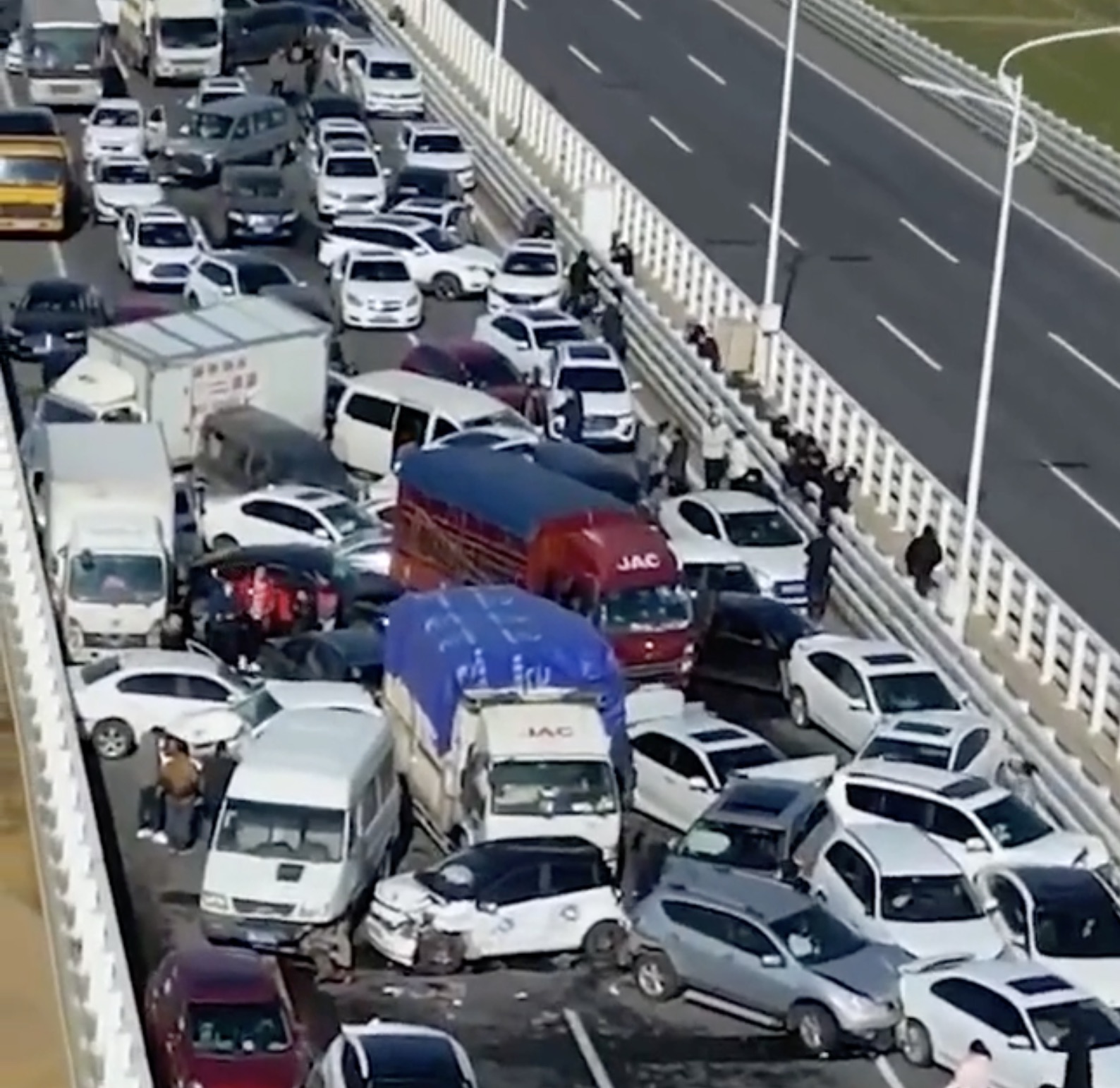 A major pile-up involving more than 200 cars took place this morning on the Zhengzhou highway in China 